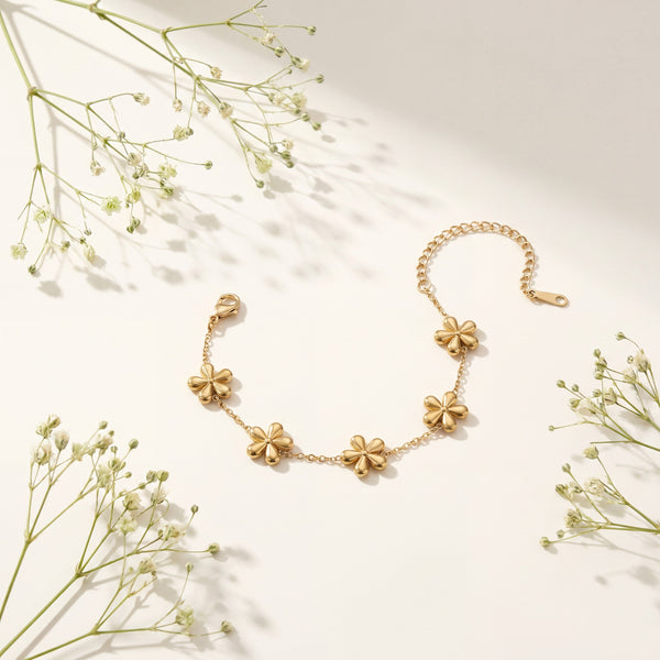 Gold Plated Delicate Chain Bracelet with Multiple Gold Floral Quatrefoil Charm Stations and Lobster Clasp