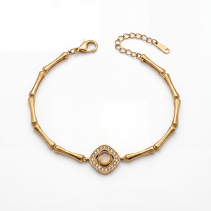 Gold Plated Bamboo Bar Link Bracelet with Rhombus Pink Stone Halo Centrepiece and Lobster Clasp