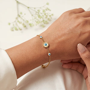 Gold Plated Chain Bracelet with Blue Evil Eye Bead Stations and Central Halo Evil Eye Charm