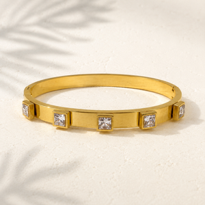 Gold Evenly Spaced Square Solitaire Diamond Oval Kada for Women | Channel Set Single Stone Stainless Steel Ladies Bangle | Premium Festive Jewellery