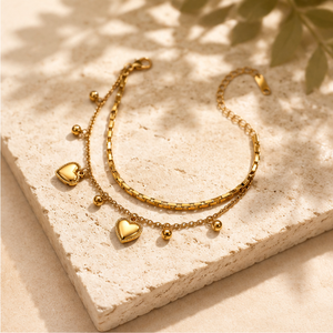 Gold Plated Double Strand Layered Chain Bracelet with Dangling Heart Charms and Bead Drops