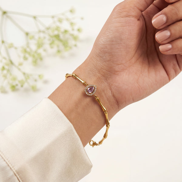 Gold Plated Bamboo Bar Link Bracelet with Oval Pink Stone Halo Centrepiece and Lobster Clasp