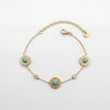 Gold Plated Delicate Chain Bracelet with Turquoise Round Halo Stations and White Stone Accents