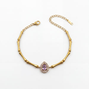 Gold Plated Bamboo Bar Link Bracelet with Oval Pink Stone Halo Centrepiece and Lobster Clasp