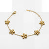 Gold Plated Delicate Chain Bracelet with Multiple Gold Floral Quatrefoil Charm Stations and Lobster Clasp