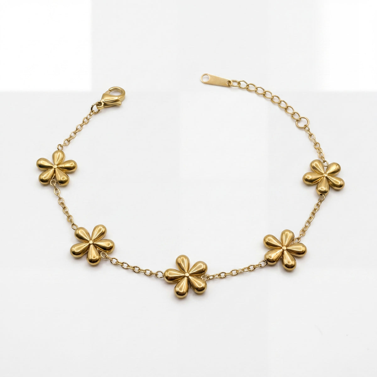 Gold Plated Delicate Chain Bracelet with Multiple Gold Floral Quatrefoil Charm Stations and Lobster Clasp