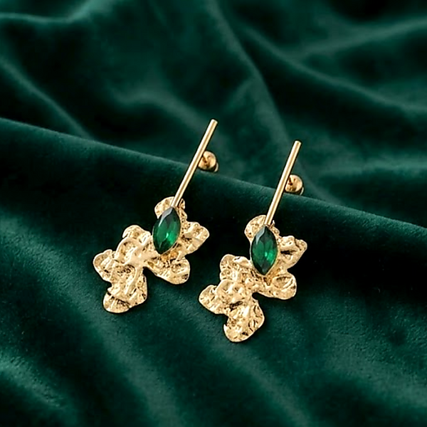 Anti-Tarnish Gold Plated Abstract Floral Crystal Green Earrings by House of Viya on green velvet background
