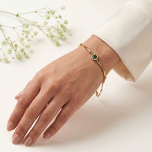 Gold Plated Bamboo Bar Link Bracelet with Round Green Stone Halo Centrepiece and Lobster Clasp