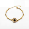 Gold Plated Bamboo Bar Link Bracelet with Rhombus Black Stone Halo Centrepiece and Lobster Clasp