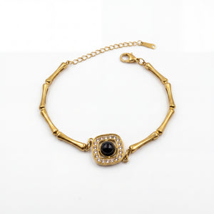Gold Plated Bamboo Bar Link Bracelet with Rhombus Black Stone Halo Centrepiece and Lobster Clasp