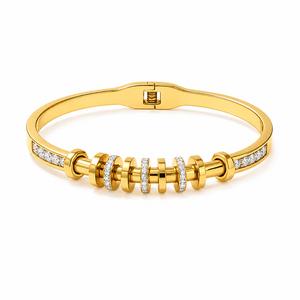 Gold bracelet with diamond accents on a white background