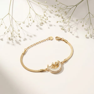 Gold Plated Snake Chain Bracelet with Crescent Moon Mother of Pearl Charm and Floral Star Accent