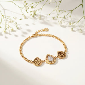 Gold Plated Chain Bracelet with Three Rhombus Filigree Medallion Stations and White Stone Centers