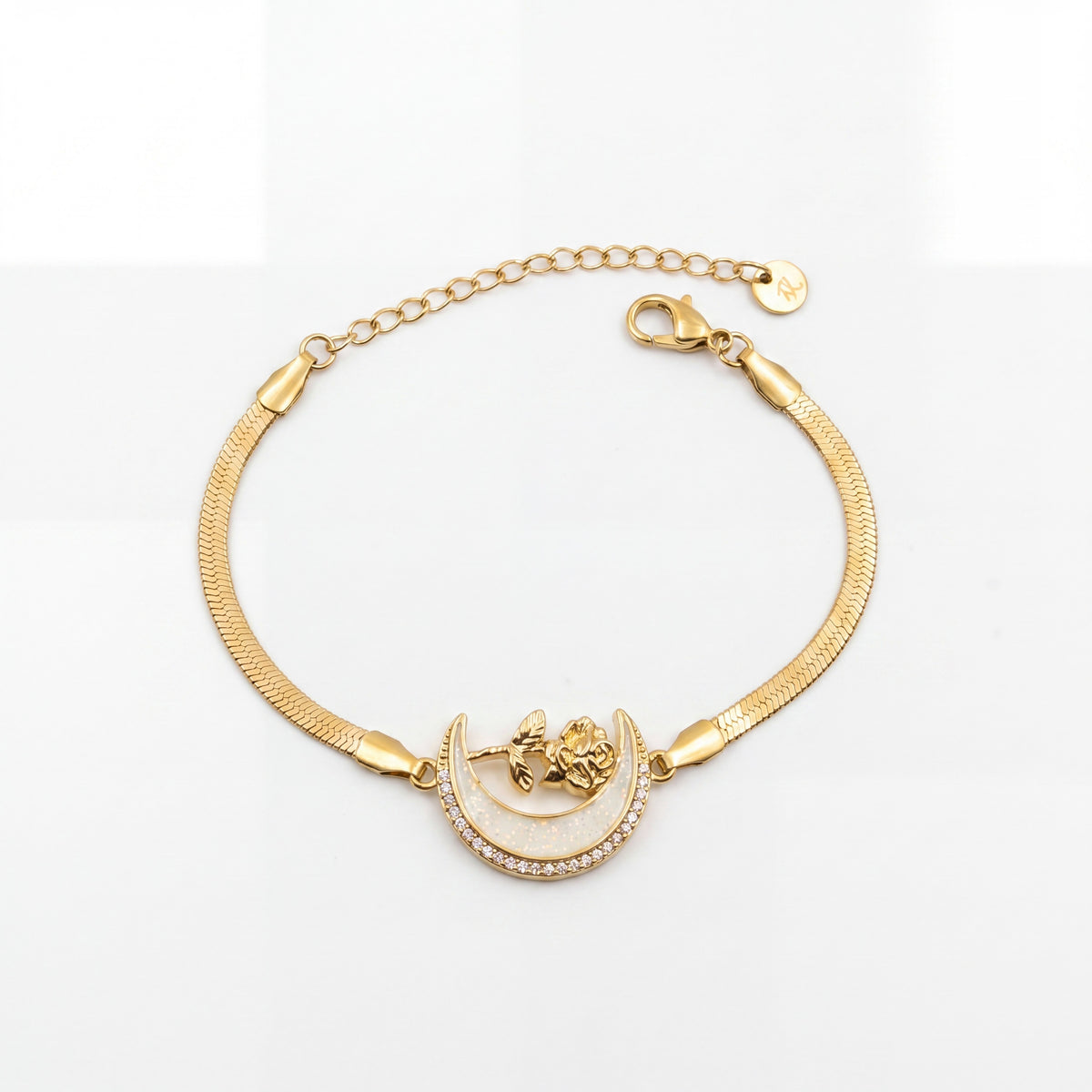 Gold Plated Snake Chain Bracelet with Crescent Moon Mother of Pearl Charm and Floral Star Accent