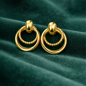 Anti-Tarnish Gold Plated Hanging 2 Spiral and 1 Plain Loop Earrings by House of Viya on green fabric background