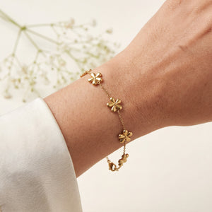 Gold Plated Delicate Chain Bracelet with Multiple Gold Floral Quatrefoil Charm Stations and Lobster Clasp