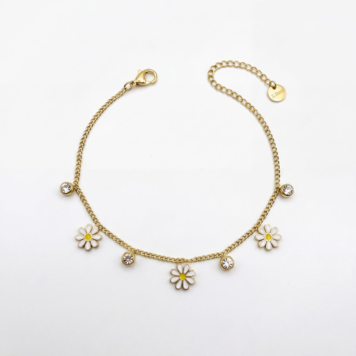 Gold Plated Curb Chain Bracelet with Dangling White Enamel Daisy Flower Charms and Stone Accents