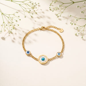 Gold Plated Chain Bracelet with Blue Evil Eye Bead Stations and Central Halo Evil Eye Charm