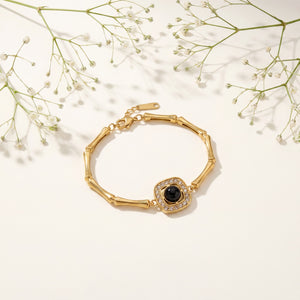 Gold Plated Bamboo Bar Link Bracelet with Rhombus Black Stone Halo Centrepiece and Lobster Clasp