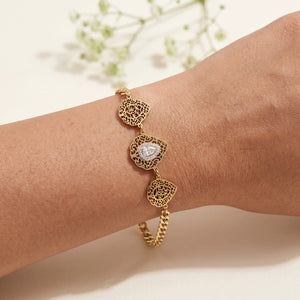 Gold Plated Chain Bracelet with Three Rhombus Filigree Medallion Stations and White Stone Centers