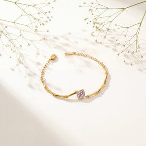 Gold Plated Bamboo Bar Link Bracelet with Oval Pink Stone Halo Centrepiece and Lobster Clasp