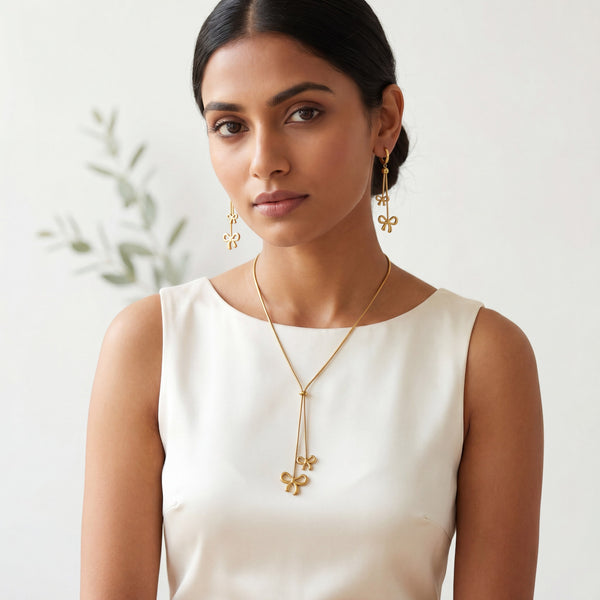 Anti tranish Gold plated 140 No. Minimal Bow pendant Chain with Hanging Bow earrings for adults - 1 Pc