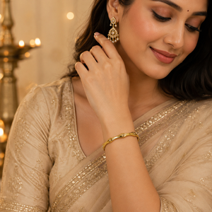 Gold Wavy Ripple Edge Scattered Diamond Oval Kada for Women | Curved Band Stone Stainless Steel Ladies Bangle | Artistic Festive Jewellery