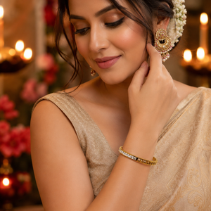 Gold Scattered Bezel Diamond Oval Kada for Women | Floating Stone Stainless Steel Ladies Bangle | Modern Festive Jewellery