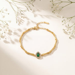 Gold Plated Bamboo Bar Link Bracelet with Side Oval Green Stone Halo Accent and Lobster Clasp