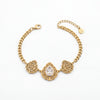 Gold Plated Chain Bracelet with Three Rhombus Filigree Medallion Stations and White Stone Centers