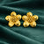 Anti-Tarnish Gold Plated Flower Stud Earrings by House of Viya on green fabric background