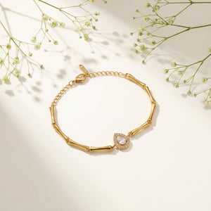 Gold Plated Bamboo Bar Link Bracelet with Side Oval White Stone Halo Accent and Lobster Clasp