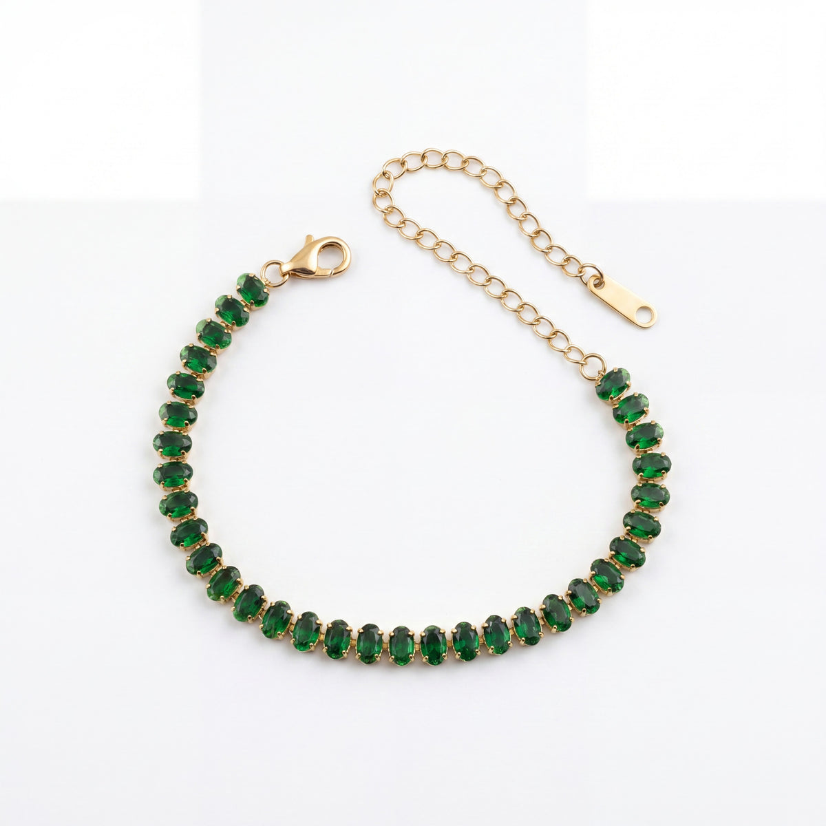 Gold Plated Continuous Oval Green Stone Tennis Bracelet with Adjustable Chain and Lobster Clasp