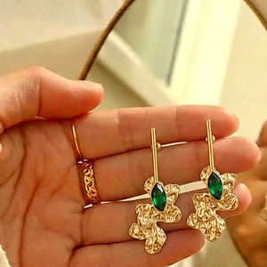 Anti-Tarnish Gold Plated Abstract Floral Crystal Green Earrings held in hand - House of Viya
