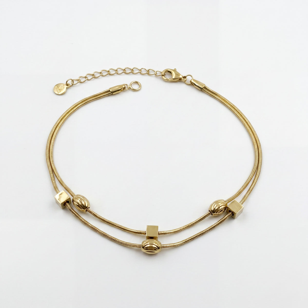 Gold Plated Double Strand Snake Chain Bracelet with Polished Bead Station Accents and Lobster Clasp