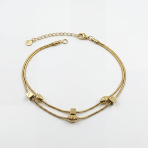 Gold Plated Double Strand Snake Chain Bracelet with Polished Bead Station Accents and Lobster Clasp