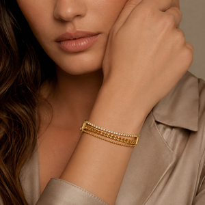 Gold Plated Triple Strand Bracelet with Curb Chain Center and Pave White Stone Side Chains