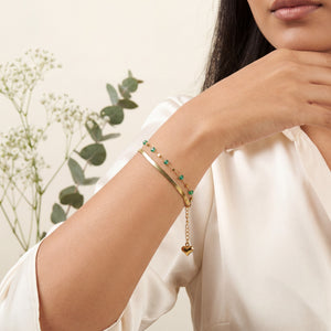 Woman wearing Anti-Tarnish Gold Plated Snake Chain Green Aura Beads Bracelet on wrist - House of Viya