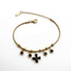 Gold Plated Snake Chain Bracelet with Black Clover and Black Stone Charm Cluster