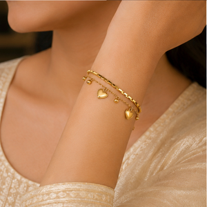 Gold Plated Double Strand Layered Chain Bracelet with Dangling Heart Charms and Bead Drops