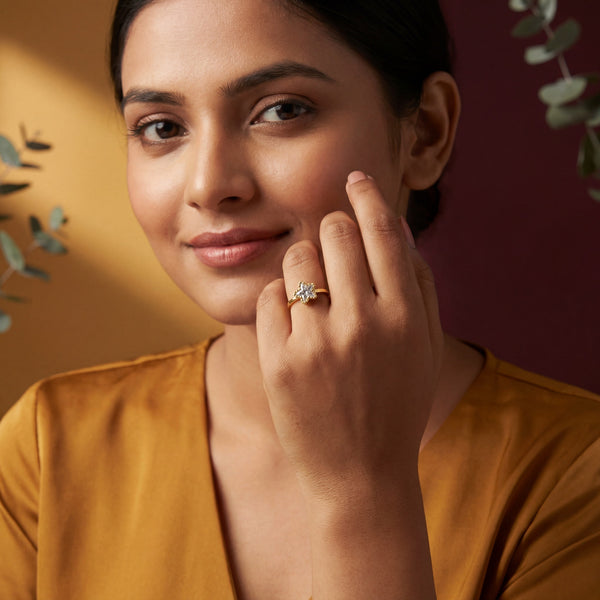 Woman Wearing House of Viya Gold Plated CZ Star Solitaire Ring – Lifestyle Shot of Anti-Tarnish Stainless Steel Ring