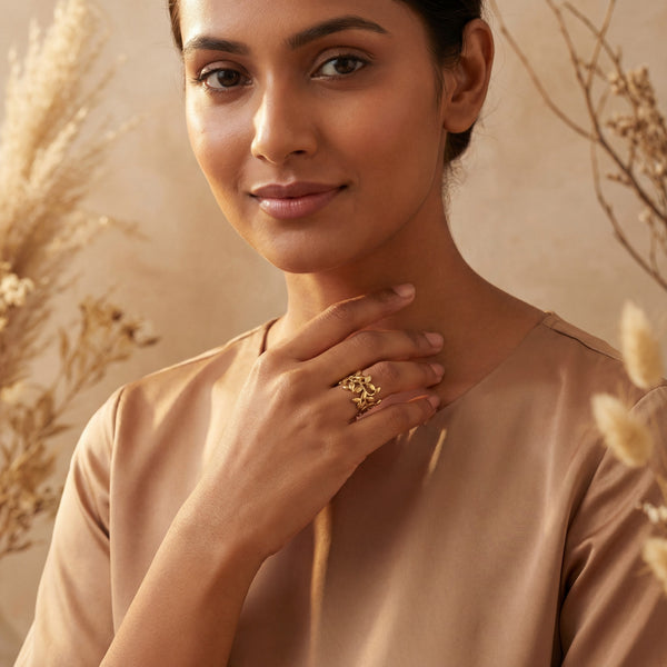 Woman Wearing Gold Plated Leaf Vine Wrap Ring - Elegant Nature-Inspired Statement Jewelry for Women by House of Viya